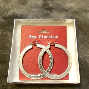 Stearling Silver hoop earrings with stamped design